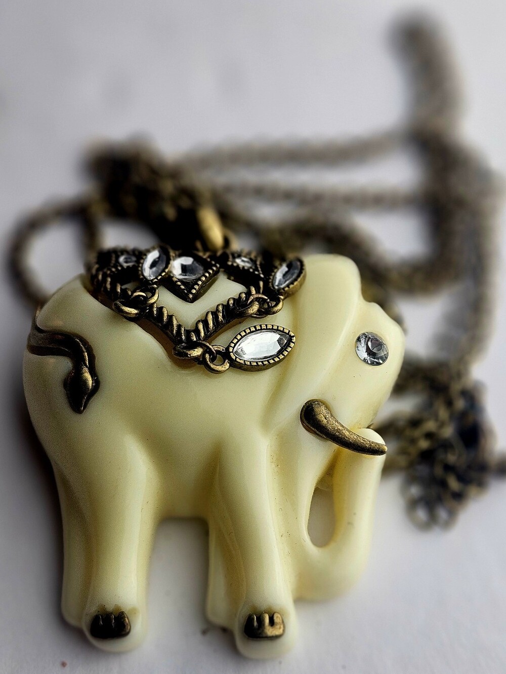 Vintage Avon NRT Faux Ivory Elephant Pendant Necklace, Ornate Antiqued Gold Tone